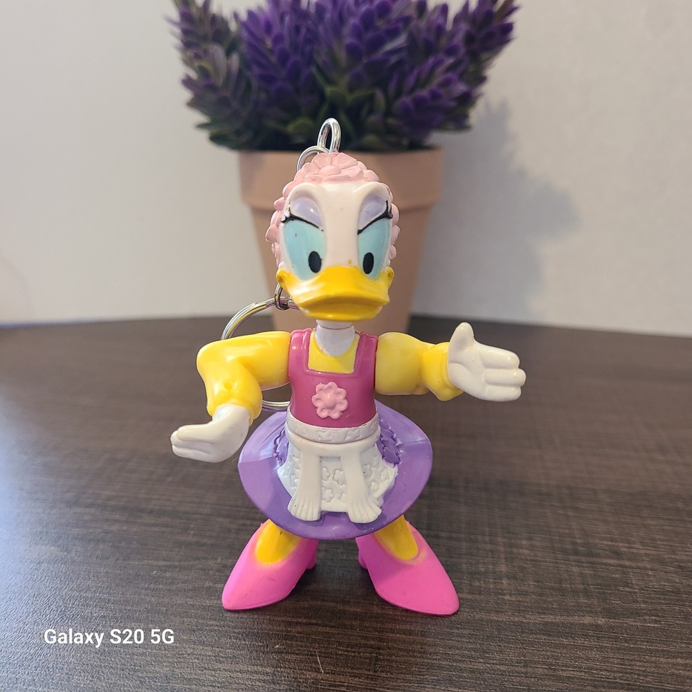 Disney Daisy Duck Keychain Figure Pink Purple Yellow Plastic Pre-Owned